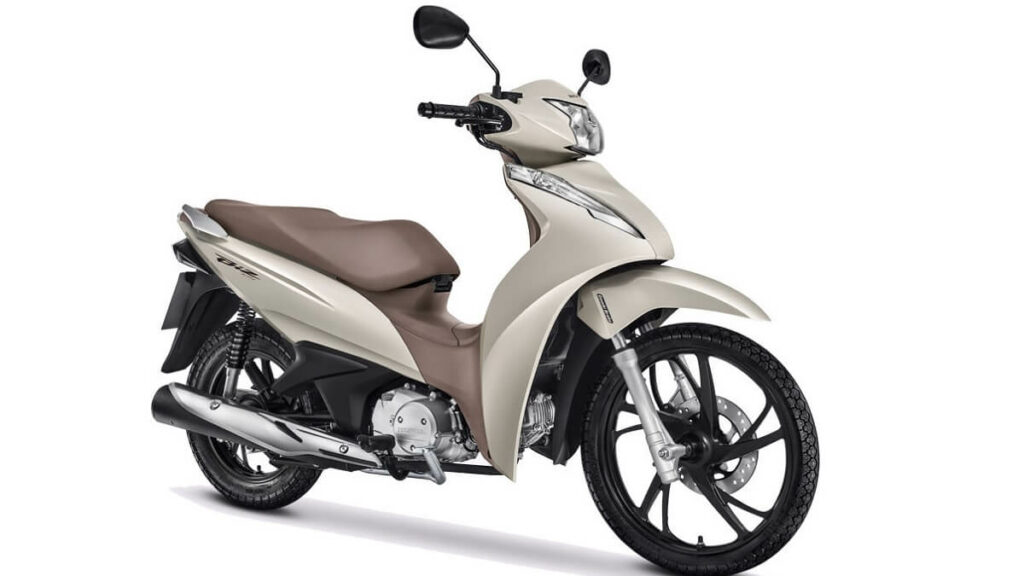 Foto lateral de uma Biz 2021 na cor branco perolizado com bege