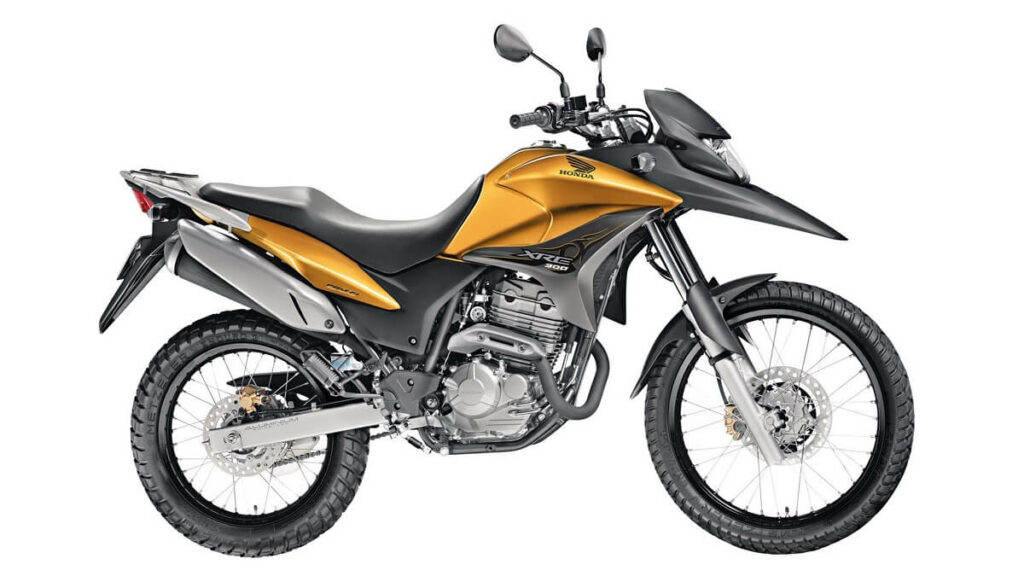 Foto lateral de uma XRE 300 2011 amarela