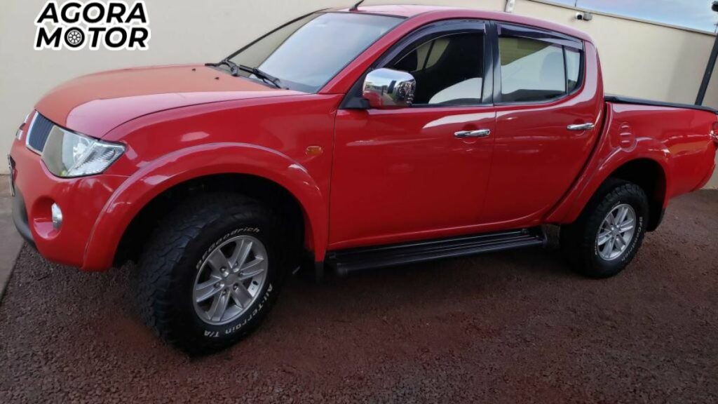 foto de uma l200 triton 2009 vermelha