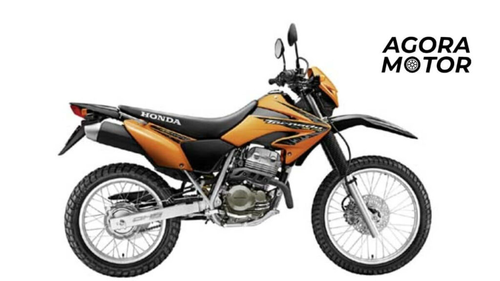 Foto de uma Honda Tornado 2008 laranja e preto
