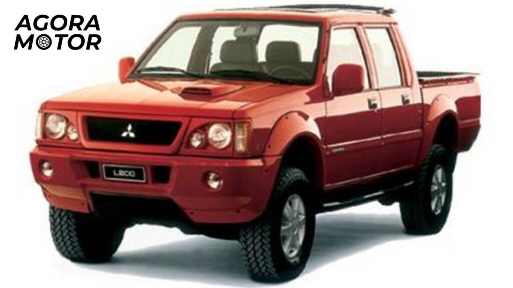 Foto de um L200 1999 vermelho