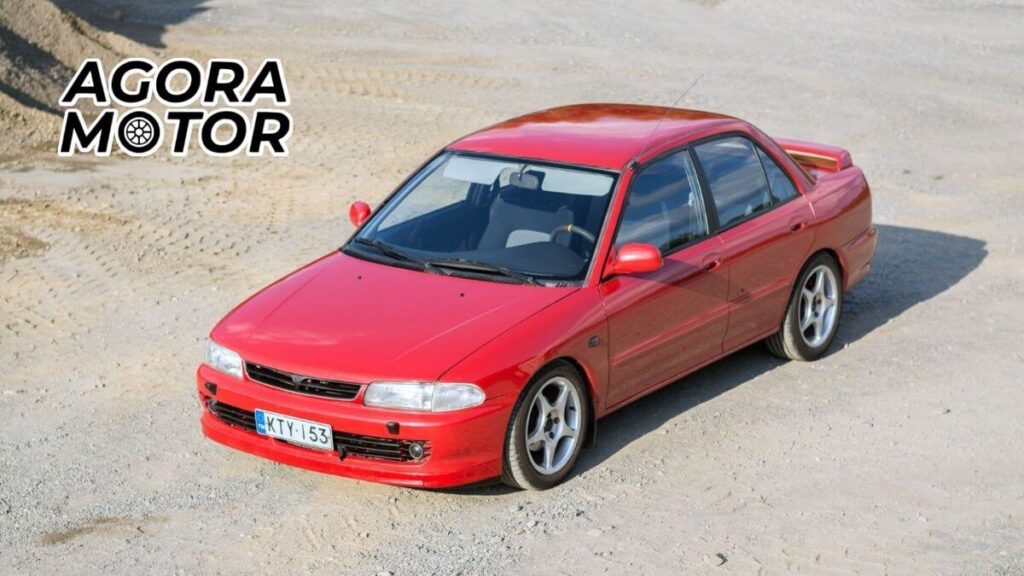 Foto de um Lancer 1993 vermelho