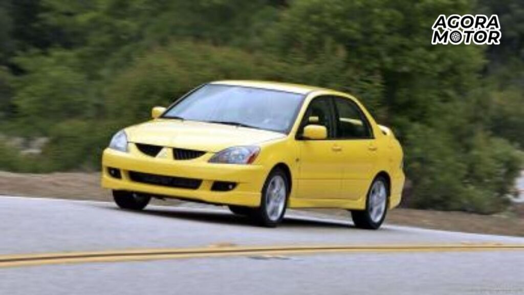 Foto de um Lancer 2003 amarelo