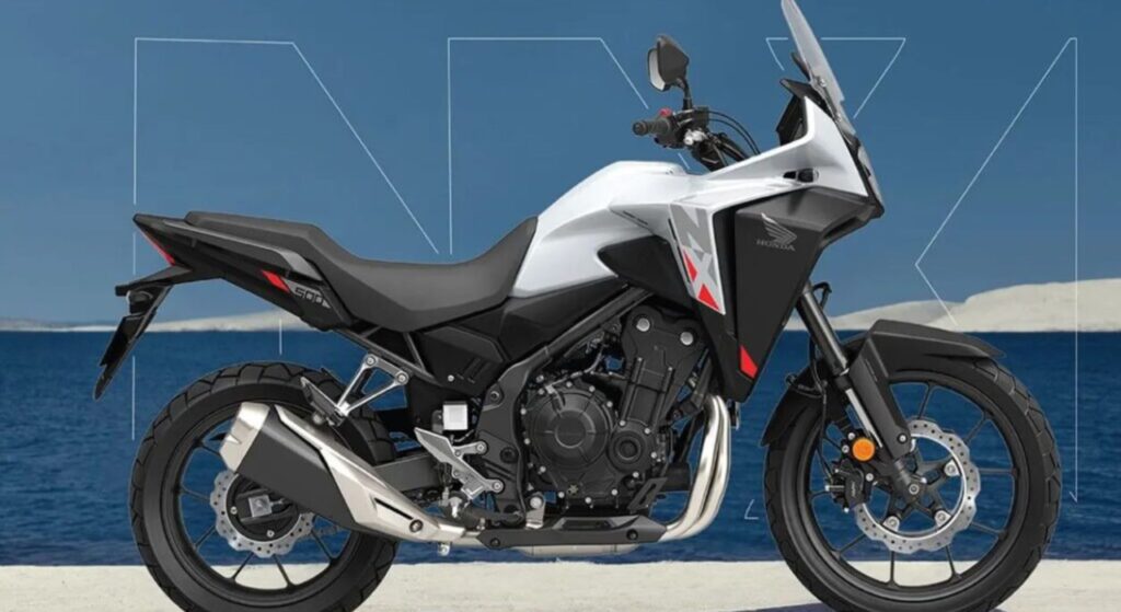 Honda FALCON 1999 branca de lado.