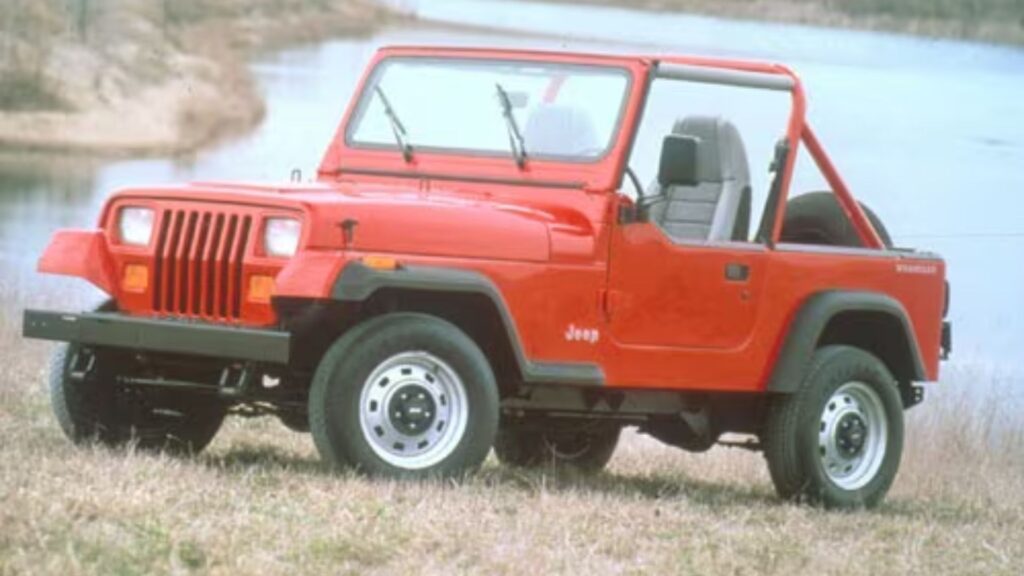 Jeep Wrangler 1993 vermelho na diagonal.